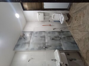 Washroom in 1 BHK Apartment at Baba Solitaire, Vashi Sector 26 – for Rent