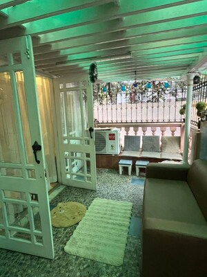 Living Room in 2 BHK Apartment at Versova Denzil CHS, Andheri West – for Rent