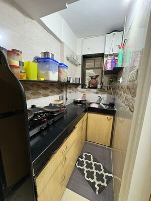Kitchen in 1 BHK Apartment at K Raheja Evening Star, Powai – for Rent