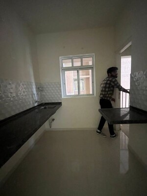 Kitchen in 2 BHK Apartment at Godrej Green Cove, Mahalunge – for Rent
