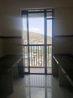 Kitchen in 2 BHK Apartment at Damji Shamji Mahavir Spring Tulip Phase 1, Pokhran Road No Two – for Sale