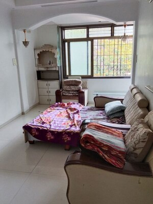Living Room in 2 BHK Apartment at Bhavani CHS, Dadar West – for Rent