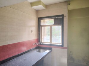 Kitchen in 1 BHK Apartment at Sanghvi Hills, Ghodbunder Road – for Sale