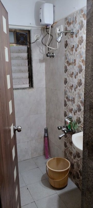 Bathroom in 1 BHK Apartment at Aparna  Juhu, Juhu – for Rent