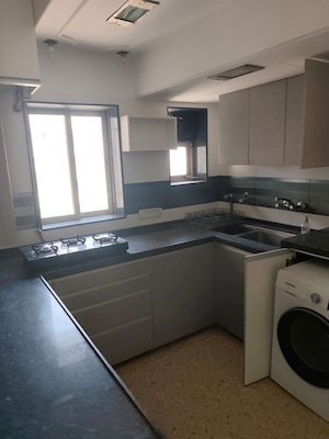 Kitchen in 2 BHK Apartment at Mehrdad CHS, Cuffe Parade – for Sale