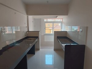 Kitchen in 2 BHK Apartment at Banali Apartment Aundh, Aundh – for Rent