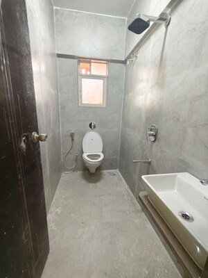Bathroom in 2 BHK Apartment at Elite The Crown, Tilak Nagar – for Rent