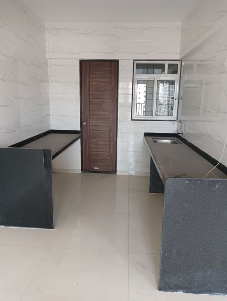Kitchen, veddant-ganesh-bella-rossa-phase-2 3 Bedroom 1350 Sq.Ft. Apartment In Punawale Pune 10333497