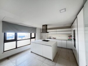 Kitchen in 4 BHK Apartment at Panchshil One North, Magarpatta City – for Rent