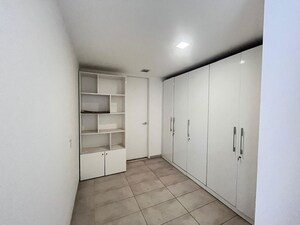 Cupboard in 4 BHK Apartment at Panchshil One North, Magarpatta City – for Rent