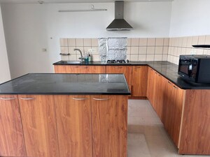 Kitchen in 3.5 BHK Apartment at Panchshil One North, Magarpatta City – for Rent