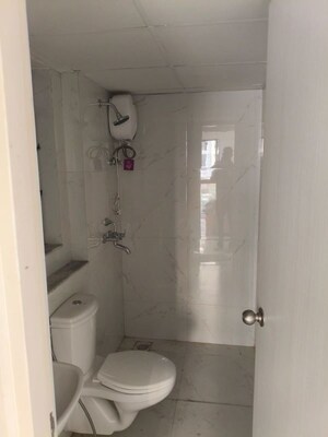 Bathroom in 2 BHK Apartment at Runwal Gardens, Dombivli East – for Rent