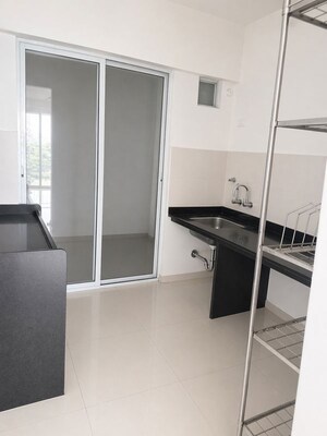 Kitchen in 2 BHK Apartment at Mantra Parkview, Dhayari – for Rent