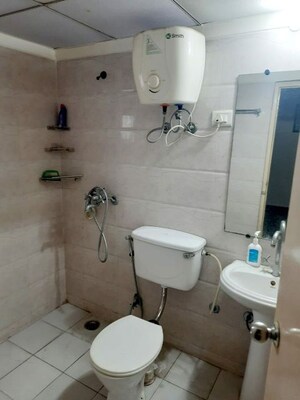 Bathroom in 2 BHK Apartment at Gaur City 6th Avenue, Sector 4 Greater Noida – for Rent