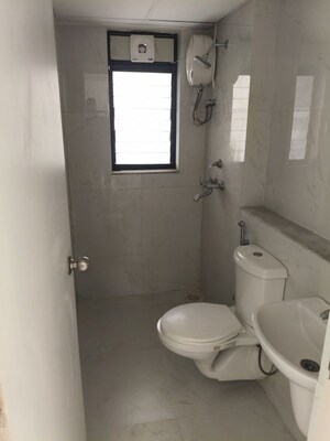 Bathroom in 2 BHK Apartment at Runwal Gardens, Dombivli East – for Rent