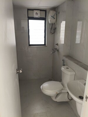Bathroom in 2 BHK Apartment at Runwal Gardens, Dombivli East – for Rent