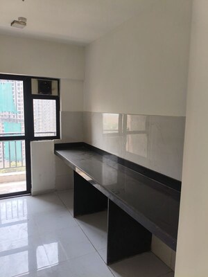 Kitchen in 2 BHK Apartment at Runwal Gardens, Dombivli East – for Rent