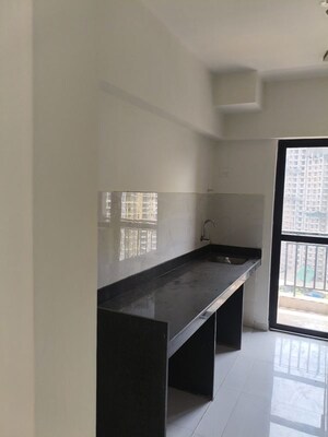 Kitchen in 2 BHK Apartment at Runwal Gardens, Dombivli East – for Rent