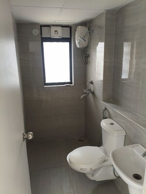 Bathroom in 2 BHK Apartment at Runwal Gardens, Dombivli East – for Rent