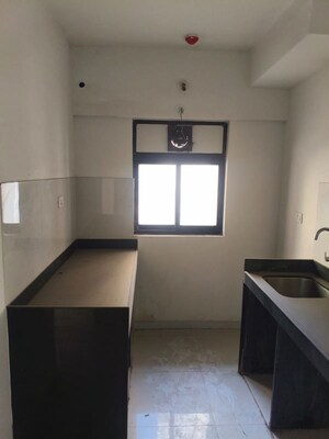 Kitchen in 1 BHK Apartment at Runwal Gardens, Dombivli East – for Rent