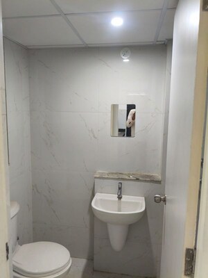 Bathroom in 1 BHK Apartment at Runwal Gardens, Dombivli East – for Rent