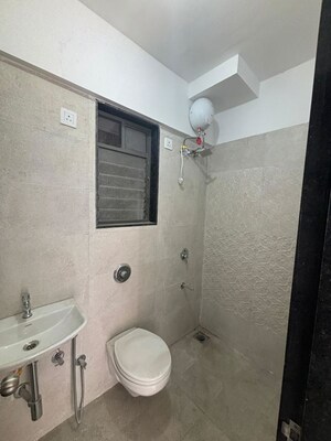 Bathroom in 1 BHK Apartment at UK Iridium, Kandivali East – for Rent