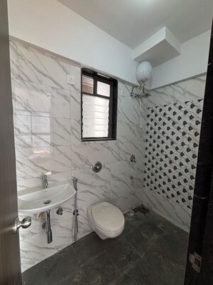 Bathroom in 1 BHK Apartment at UK Iridium, Kandivali East – for Rent