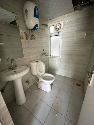 Bathroom in 2 BHK Apartment at Panchsheel Greens, Sector 16 Greater Noida – for Rent