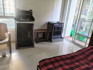Living Room in 2 BHK Apartment at Nyati Elan, Wagholi – for Rent