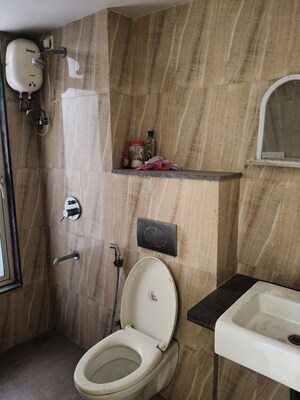 Bathroom in 3 BHK Apartment at Lodha Amara, Kolshet Road – for Rent