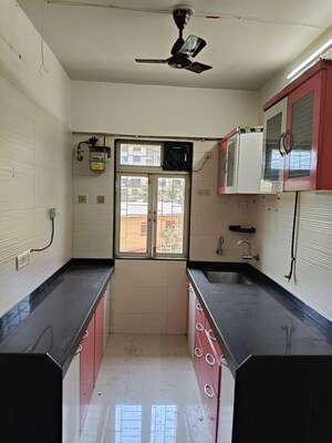 Kitchen in 2 BHK Apartment at Cosmos Classique, Ghodbunder Road – for Sale