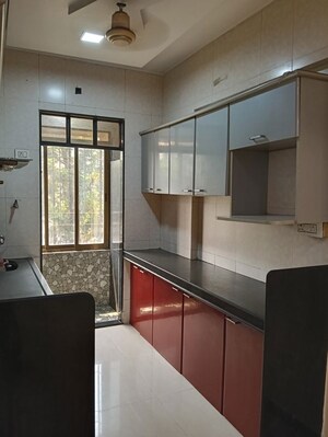 Kitchen in 2 BHK Apartment at Gajanan Tower, Dombivli West – for Sale