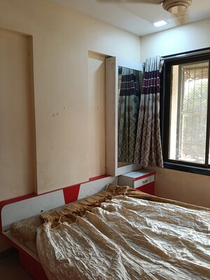 Bedroom in 2 BHK Apartment at Gajanan Tower, Dombivli West – for Sale