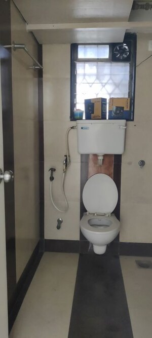 Bathroom in 2 BHK Apartment at Palash Towers, Andheri West – for Rent