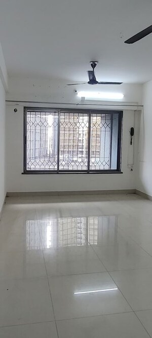 Room in 2 BHK Apartment at Palash Towers, Andheri West – for Rent
