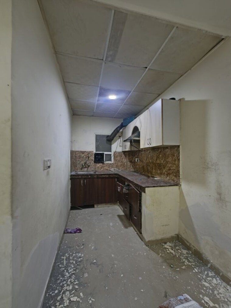 Kitchen, dream-wonder-homes 2 Bedroom 950 Sq.Ft. Builder Floor In Sector 45 Noida 10334124