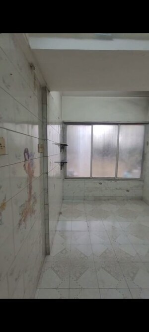 Room in 1 BHK Apartment at Adarsh CHS Vasant Vihar, Vasant Vihar – for Sale