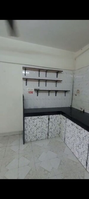 Kitchen in 1 BHK Apartment at Adarsh CHS Vasant Vihar, Vasant Vihar – for Sale