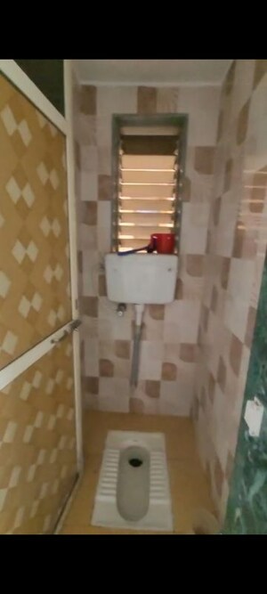 Bathroom in 1 BHK Apartment at Adarsh CHS Vasant Vihar, Vasant Vihar – for Sale