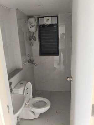 Bathroom in 2 BHK Apartment at Runwal Gardens, Dombivli East – for Rent