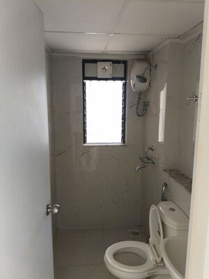 Bathroom in 2 BHK Apartment at Runwal Gardens, Dombivli East – for Rent