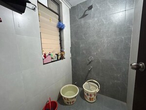 Bathroom in 1 BHK Apartment at Shapoorji Pallonji Joyville Hinjewadi, Hinjewadi – for Rent