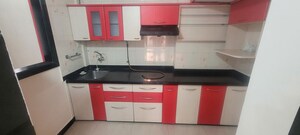 Kitchen in 2 BHK Apartment at Eden Woods complex, Manpada – for Rent