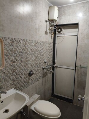 Bathroom in 2 BHK Apartment at Cosmos Classique, Ghodbunder Road – for Rent
