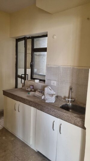 Kitchen in 3 BHK Apartment at Eros Sampoornam, Sector 2 Greater Noida – for Rent