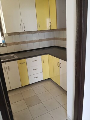 Kitchen in 3 BHK Apartment at Unitech Uniworld Gardens 2, Sector 47 – for Rent