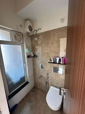 Bathroom in 2 BHK Apartment at Omkar Signet, Malad East – for Rent