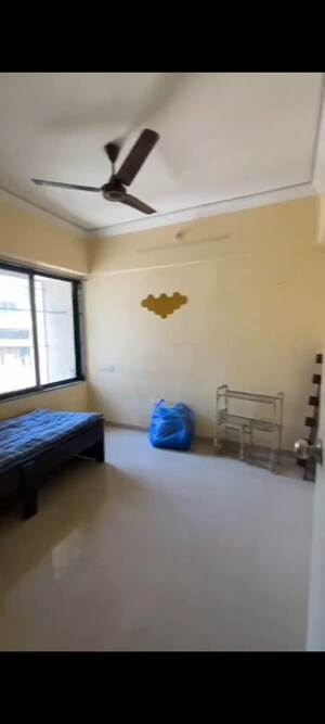 Bedroom in 2 BHK Apartment at Raunak Unnathi Greens, Kasarvadavali – for Rent