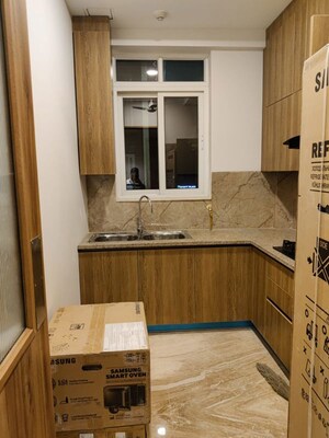 Kitchen in 2 BHK Apartment at Ambience Creacions, Sector 22 – for Rent