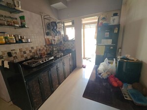 Kitchen in 1 BHK Apartment at Cosmos Orchid, Ghodbunder Road – for Rent
